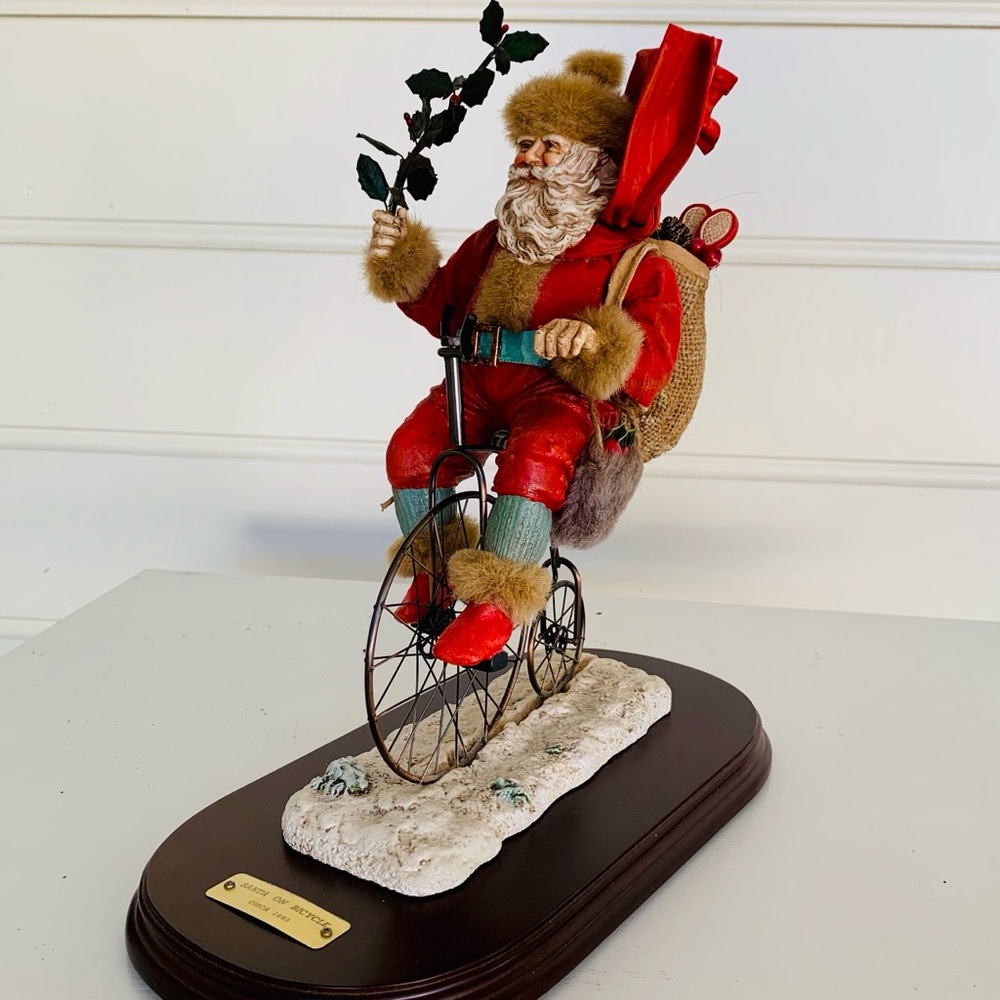 Fabric Mache Santa on a Bicycle by Kurt Adler
